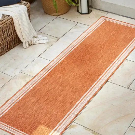 8' Orange And Cream Indoor Outdoor Runner Rug Photo 2