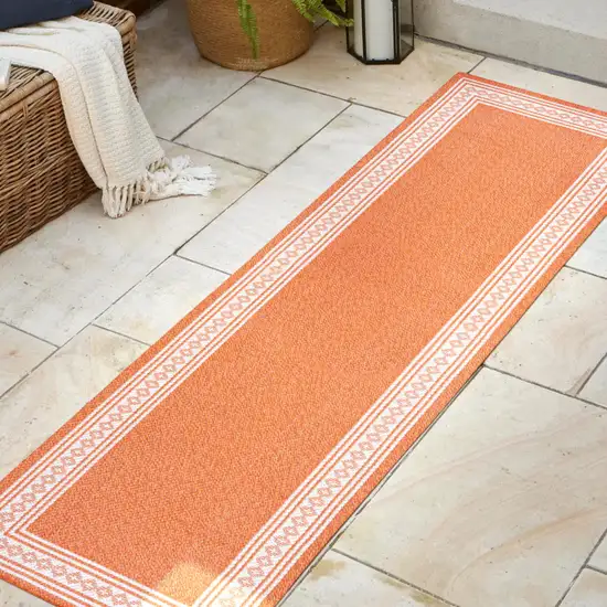 8' Orange And Cream Indoor Outdoor Runner Rug Photo 5