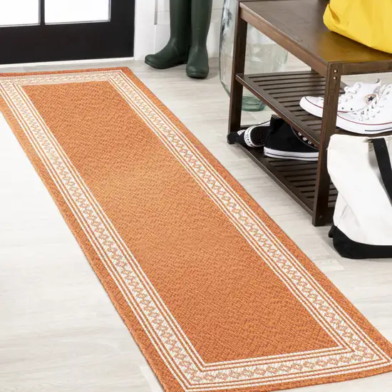 8' Orange And Cream Indoor Outdoor Runner Rug Photo 4
