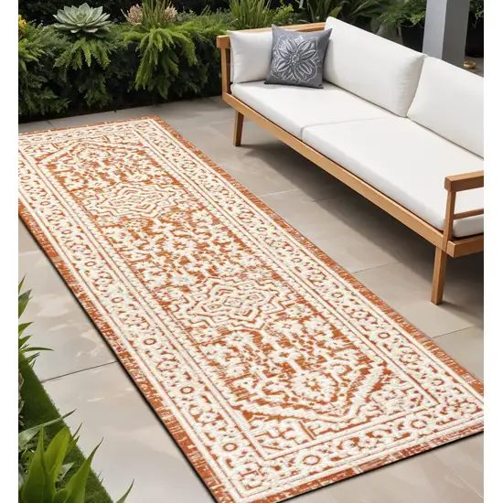 10' Orange And Cream Medallion Indoor Outdoor Runner Rug Photo 1
