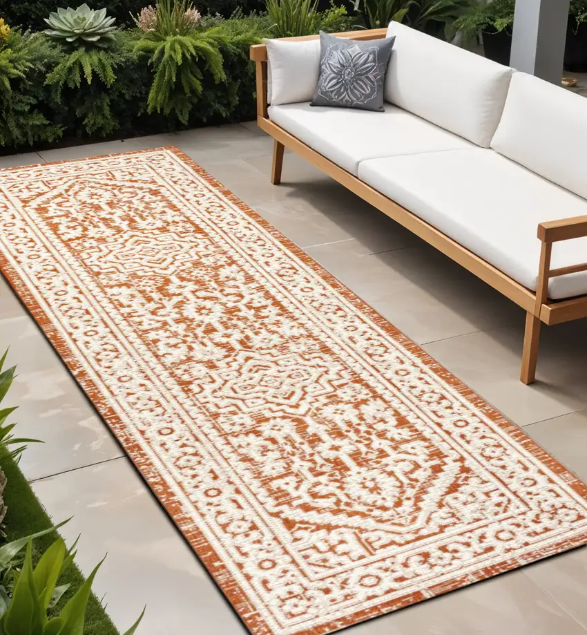 8' Orange And Cream Medallion Indoor Outdoor Runner Rug Photo 1