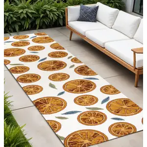 Photo of 8' Orange And Cream Polka Dot Indoor Outdoor Runner Rug