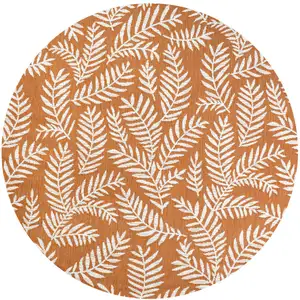 Photo of 5' Orange And Cream Round Floral Indoor Outdoor Area Rug