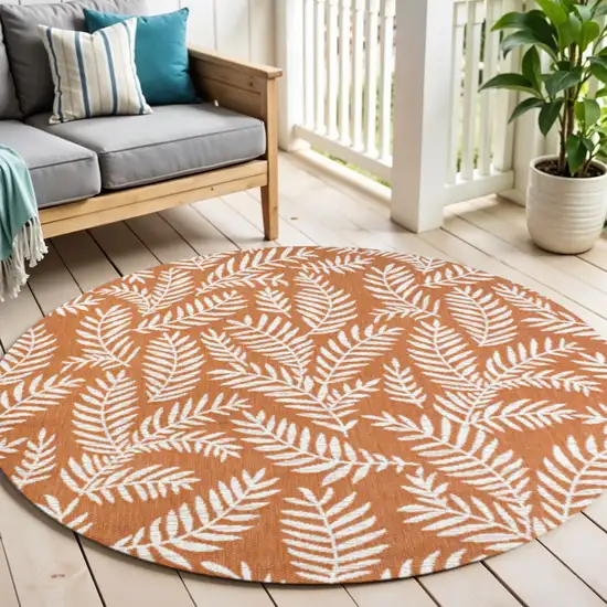 5' Orange And Cream Round Floral Indoor Outdoor Area Rug Photo 1