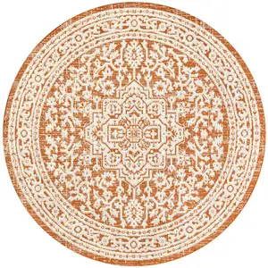 Photo of 5' Orange And Cream Round Medallion Indoor Outdoor Area Rug