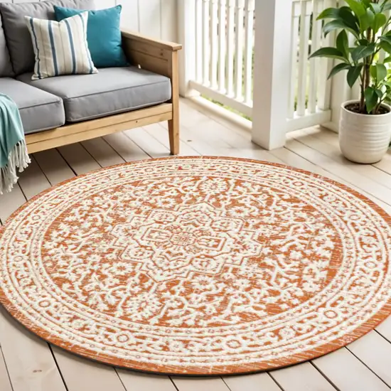 5' Orange And Cream Round Medallion Indoor Outdoor Area Rug Photo 1