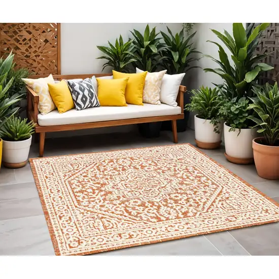5' Orange And Cream Square Medallion Indoor Outdoor Area Rug Photo 1