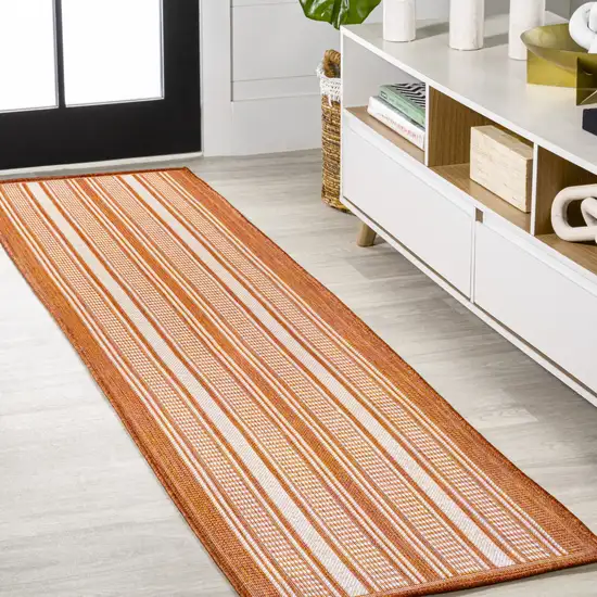 8' Orange And Cream Striped Indoor Outdoor Runner Rug Photo 1
