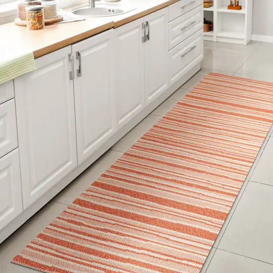 8' Orange And Cream Striped Indoor Outdoor Runner Rug Photo 6