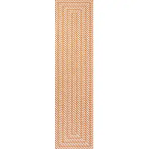 Photo of 8' Orange And Cream Striped Indoor Outdoor Runner Rug