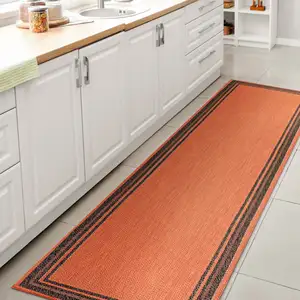 Photo of 8' Orange And Dark Gray Indoor Outdoor Runner Rug