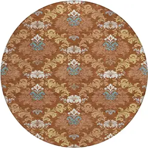 Photo of 8' Orange And Gold Round Damask Washable Indoor Outdoor Area Rug