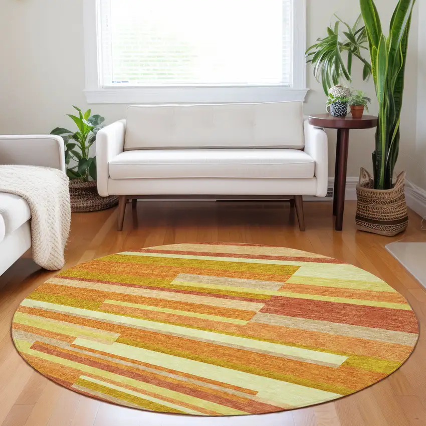 8' Orange And Gold Striped Washable Round Rug With UV Protection Photo 5