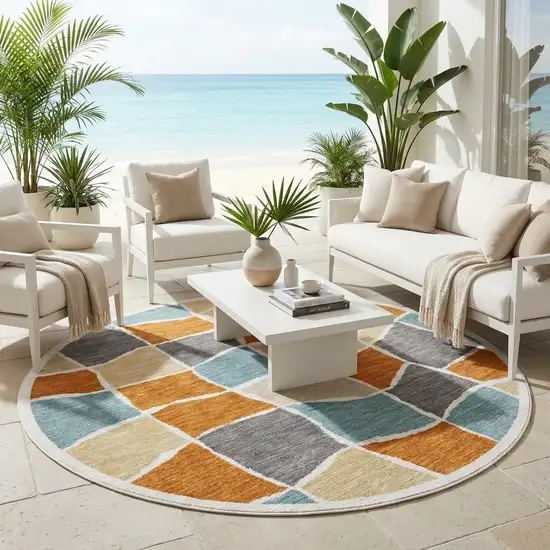 8' Orange And Graphite Round Geometric Washable Indoor Outdoor Area Rug Photo 1