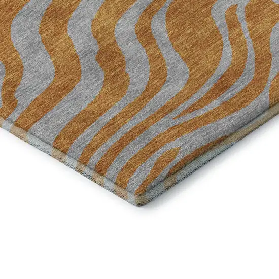 8' Orange And Gray Animal Print Washable Round Rug With UV Protection Photo 6