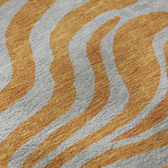 8' Orange And Gray Animal Print Washable Round Rug With UV Protection Photo 8