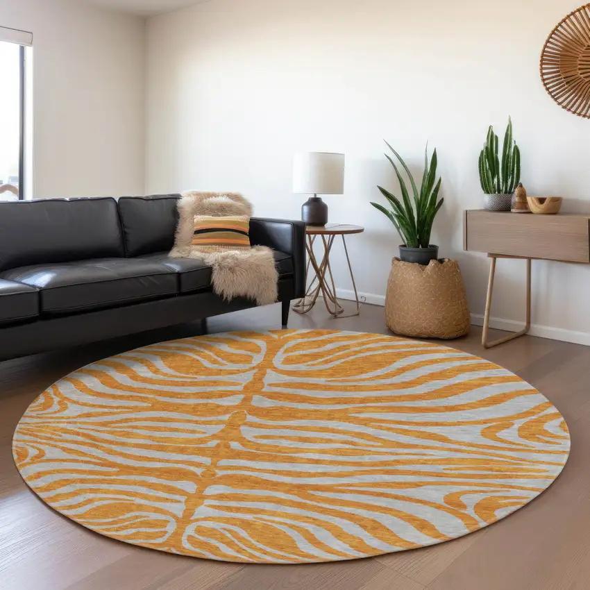 8' Orange And Gray Animal Print Washable Round Rug With UV Protection Photo 4