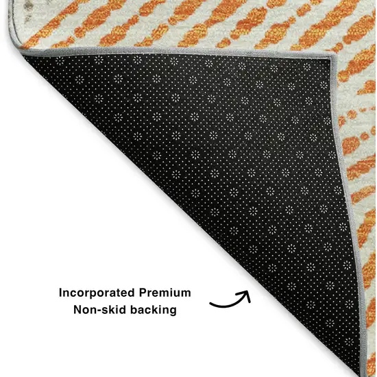 8' Orange And Gray Geometric Washable Round Rug With UV Protection Photo 6