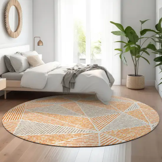8' Orange And Gray Geometric Washable Round Rug With UV Protection Photo 5