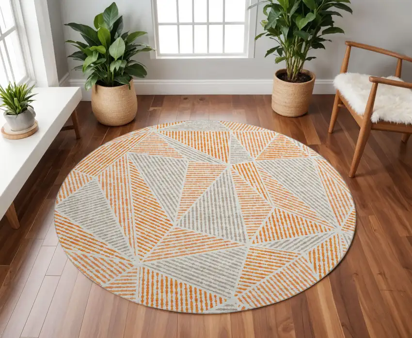8' Orange And Gray Geometric Washable Round Rug With UV Protection Photo 2