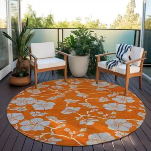 Photo of 8' Orange And Gray Round Floral Washable Indoor Outdoor Area Rug