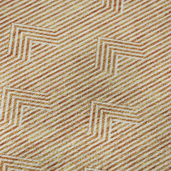 8' Orange And Ivory Abstract Geometric Washable Round Rug With UV Protection Photo 9