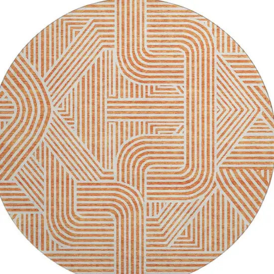 8' Orange And Ivory Abstract Geometric Washable Round Rug With UV Protection Photo 3