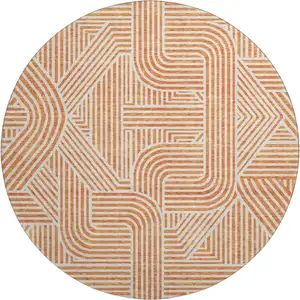 Photo of 8' Orange And Ivory Abstract Geometric Washable Round Rug With UV Protection