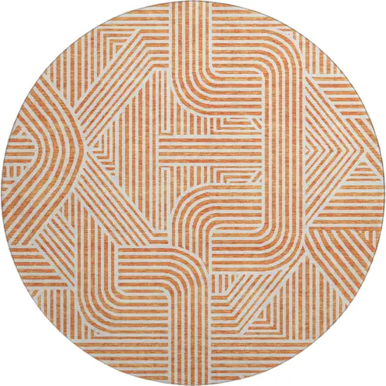 8' Orange And Ivory Abstract Geometric Washable Round Rug With UV Protection Photo 1