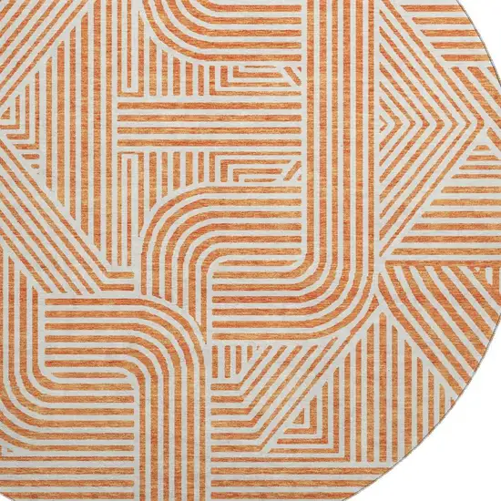 8' Orange And Ivory Abstract Geometric Washable Round Rug With UV Protection Photo 2