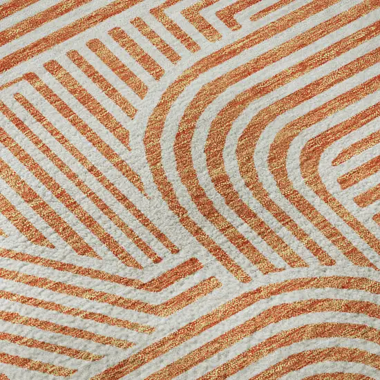 8' Orange And Ivory Abstract Geometric Washable Round Rug With UV Protection Photo 8