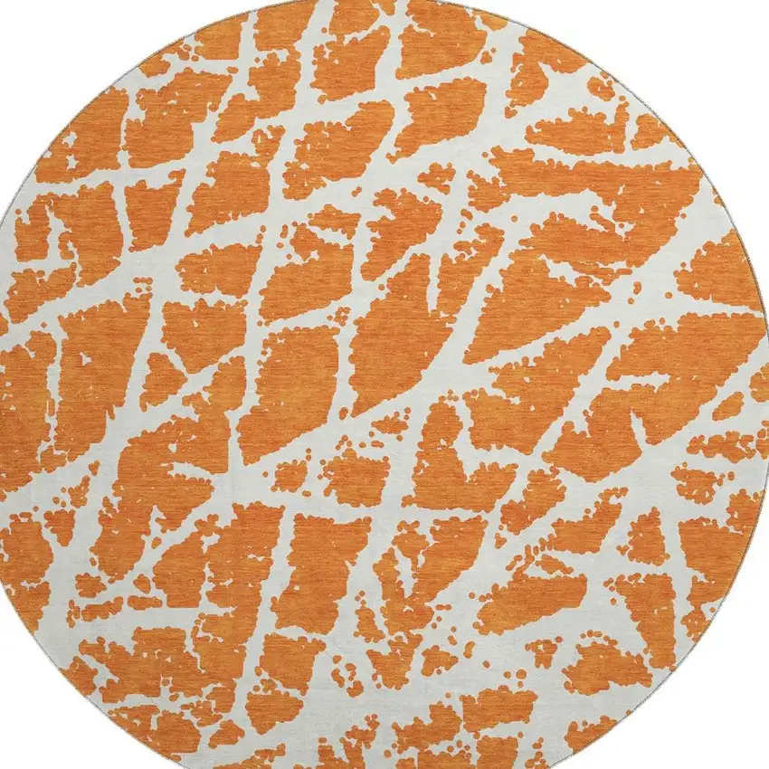 8' Orange And Ivory Abstract Washable Round Rug With UV Protection Photo 3