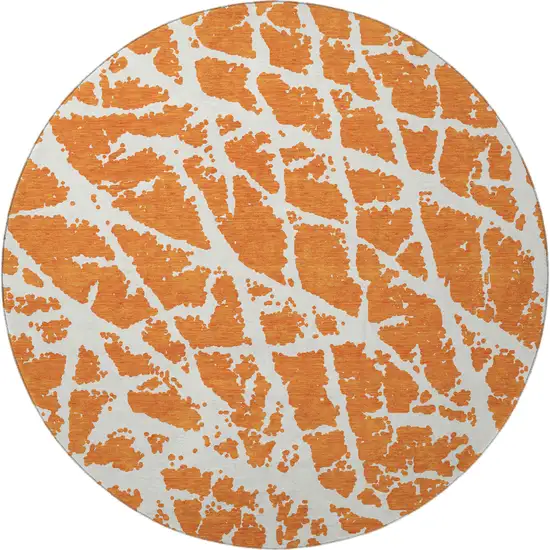 8' Orange And Ivory Abstract Washable Round Rug With UV Protection Photo 4