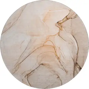 Photo of 8' Orange And Ivory Abstract Washable Round Rug With UV Protection