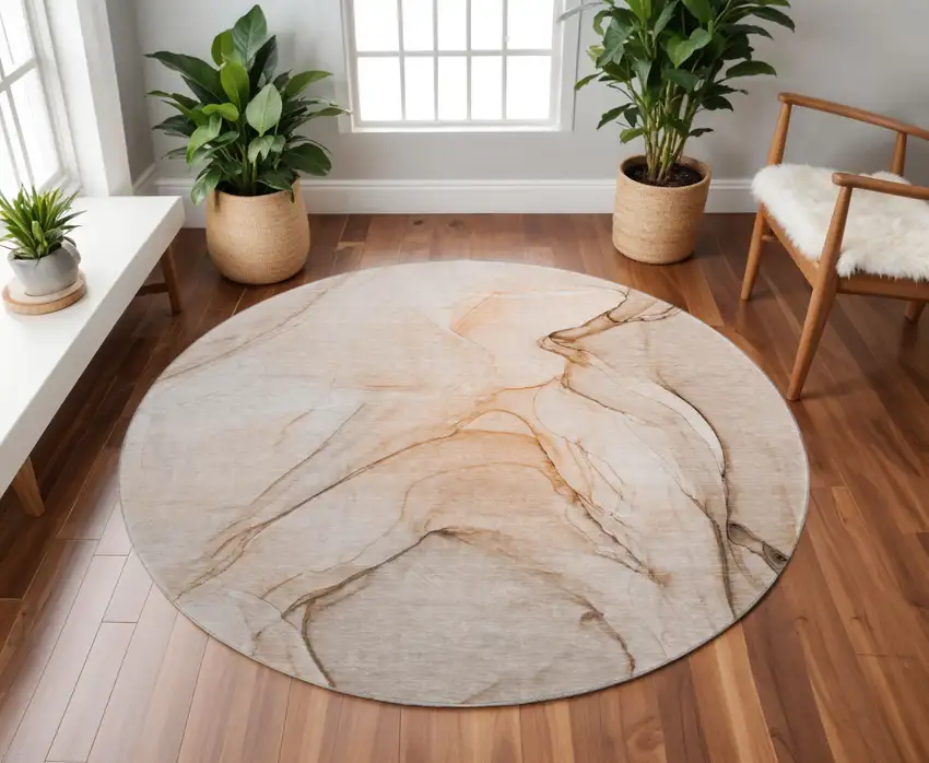 8' Orange And Ivory Abstract Washable Round Rug With UV Protection Photo 2