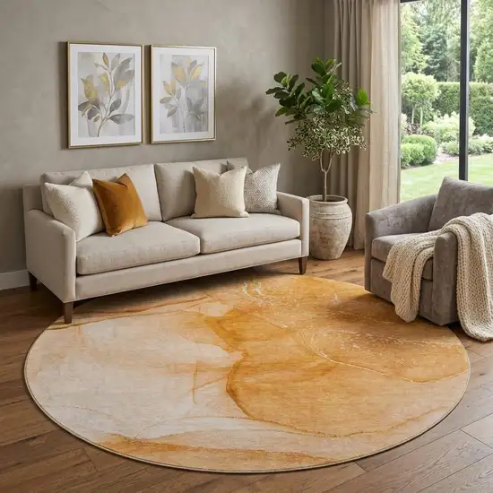 8' Orange And Ivory Abstract Washable Round Rug With UV Protection Photo 1
