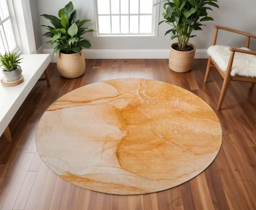 8' Orange And Ivory Abstract Washable Round Rug With UV Protection Photo 2