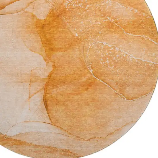 8' Orange And Ivory Abstract Washable Round Rug With UV Protection Photo 3