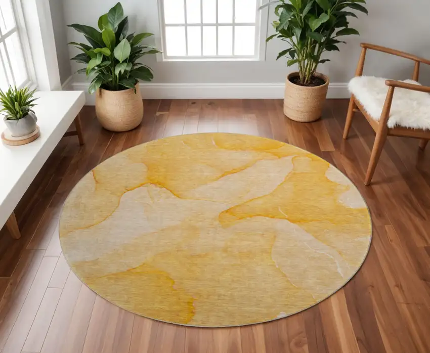 8' Orange And Ivory Abstract Washable Round Rug With UV Protection Photo 2
