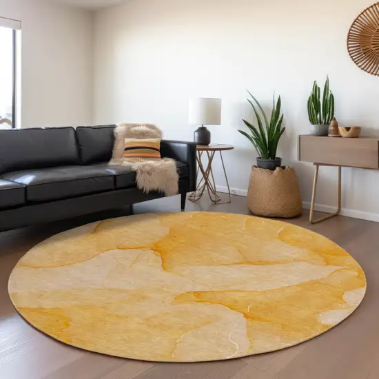8' Orange And Ivory Abstract Washable Round Rug With UV Protection Photo 5