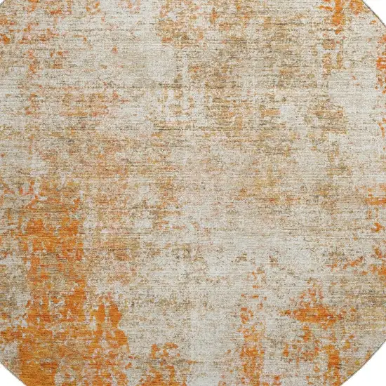 8' Orange And Ivory Abstract Washable Round Rug With UV Protection Photo 2