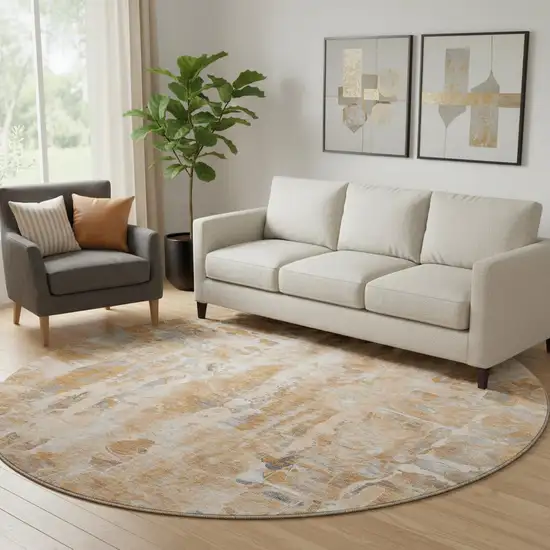 8' Orange And Ivory Abstract Washable Round Rug With UV Protection Photo 2