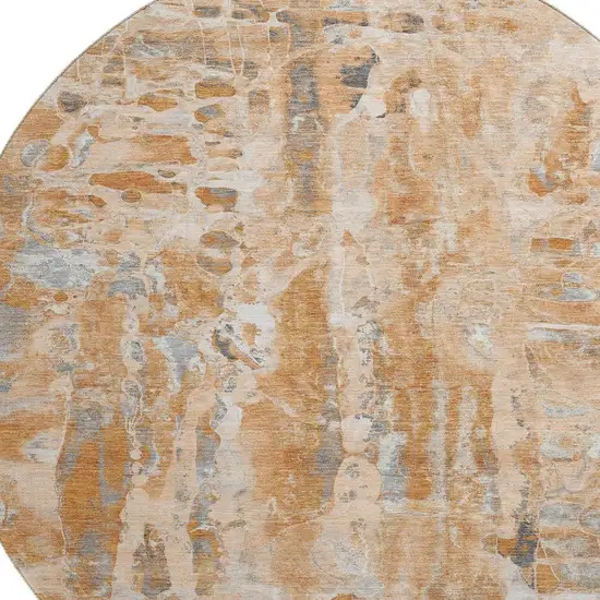 8' Orange And Ivory Abstract Washable Round Rug With UV Protection Photo 3