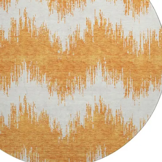 8' Orange And Ivory Chevron Washable Round Rug With UV Protection Photo 3