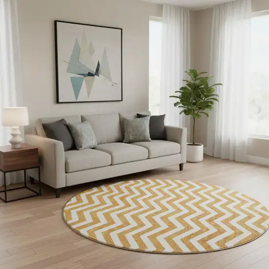 8' Orange And Ivory Chevron Washable Round Rug With UV Protection Photo 2