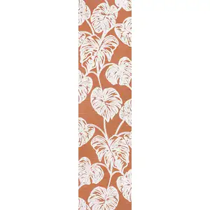 Photo of 8' Orange And Ivory Floral Indoor Outdoor Runner Rug
