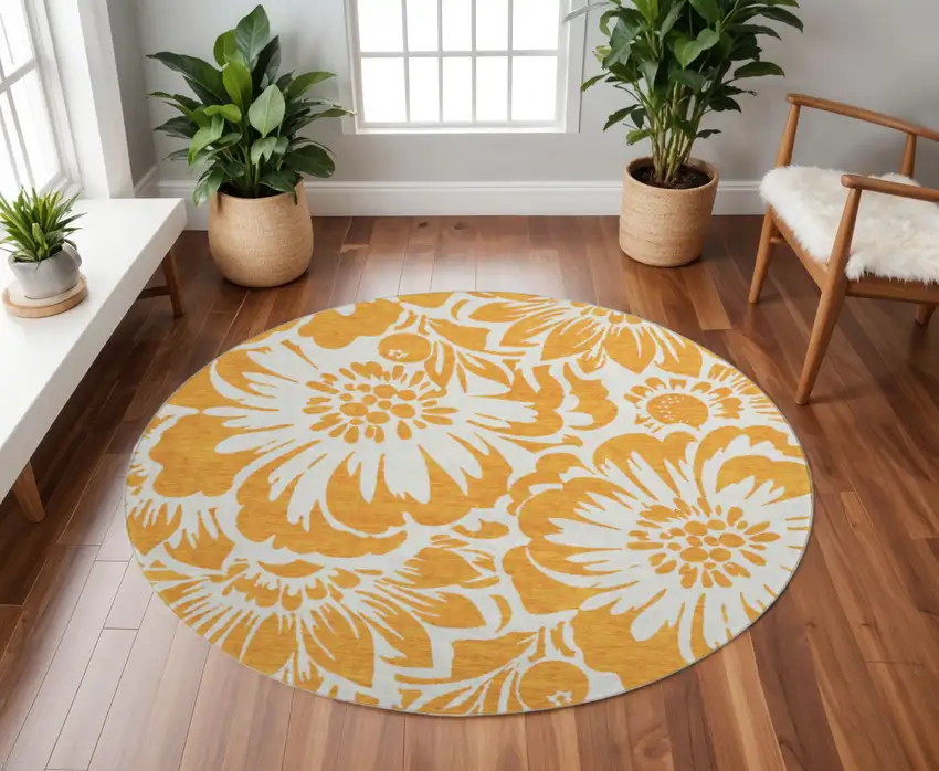 8' Orange And Ivory Floral Washable Round Rug With UV Protection Photo 2