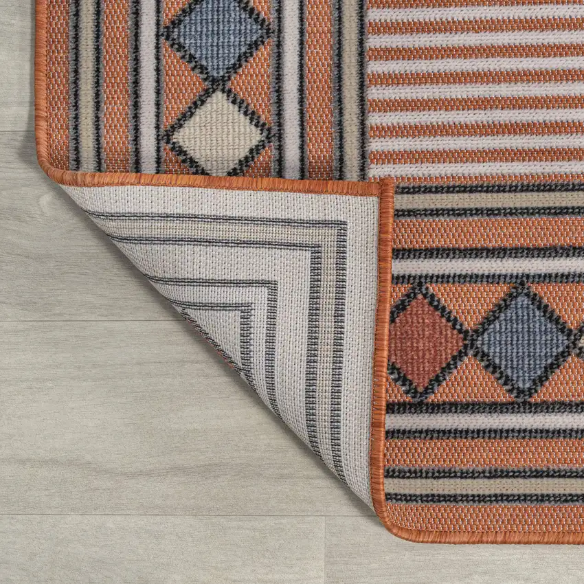 8' Orange And Ivory Geometric Indoor Outdoor Runner Rug Photo 8