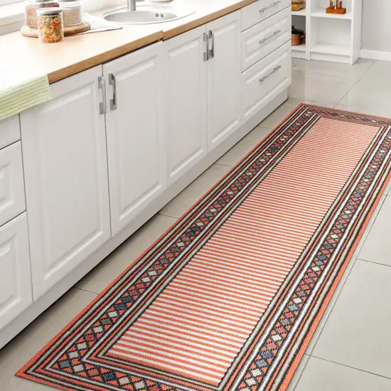 8' Orange And Ivory Geometric Indoor Outdoor Runner Rug Photo 6