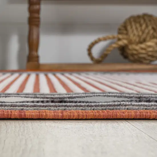 8' Orange And Ivory Geometric Indoor Outdoor Runner Rug Photo 9